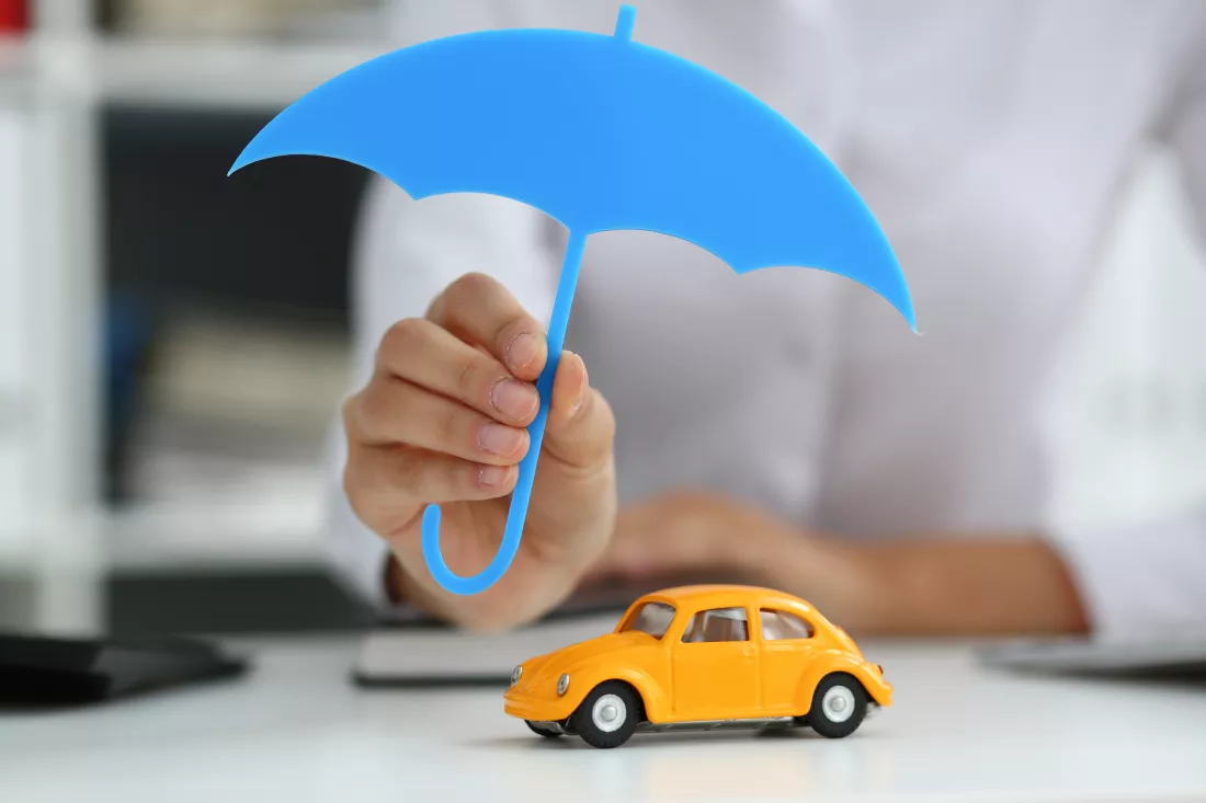 female-hand-holds-miniature-umbrella