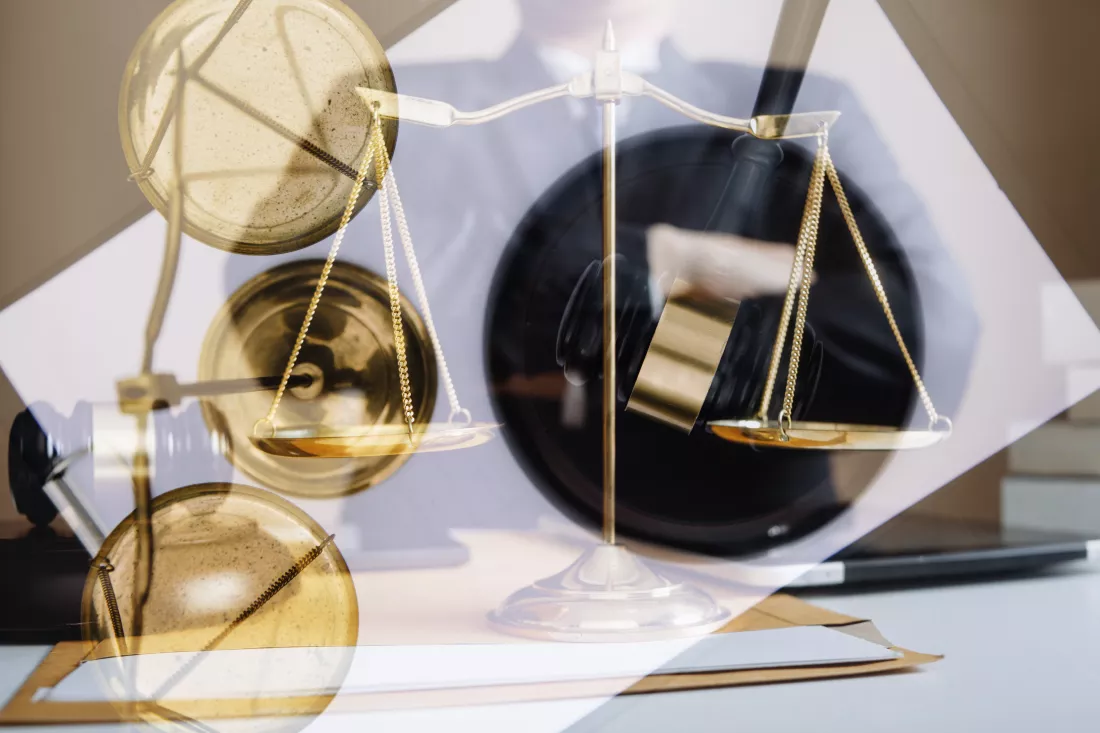 business-lawyers-discussing-contract-papers-with-brass-scale-desk-office-law-legal-services-advice-justice-law-concept-picture-with-film-grain-effect-4