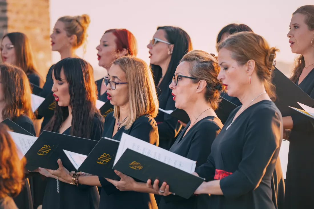 21-september-2024-ram-serbia-passionate-choir-performing-stage-highlighting-vocalists-theatrical-setting-national-festival