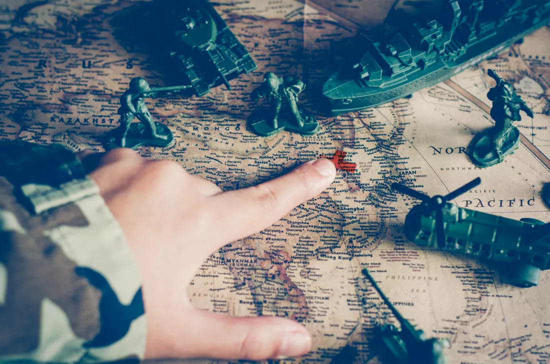 blurred-images-soldiers-tactical-battle-troops-focus-world-map-goals