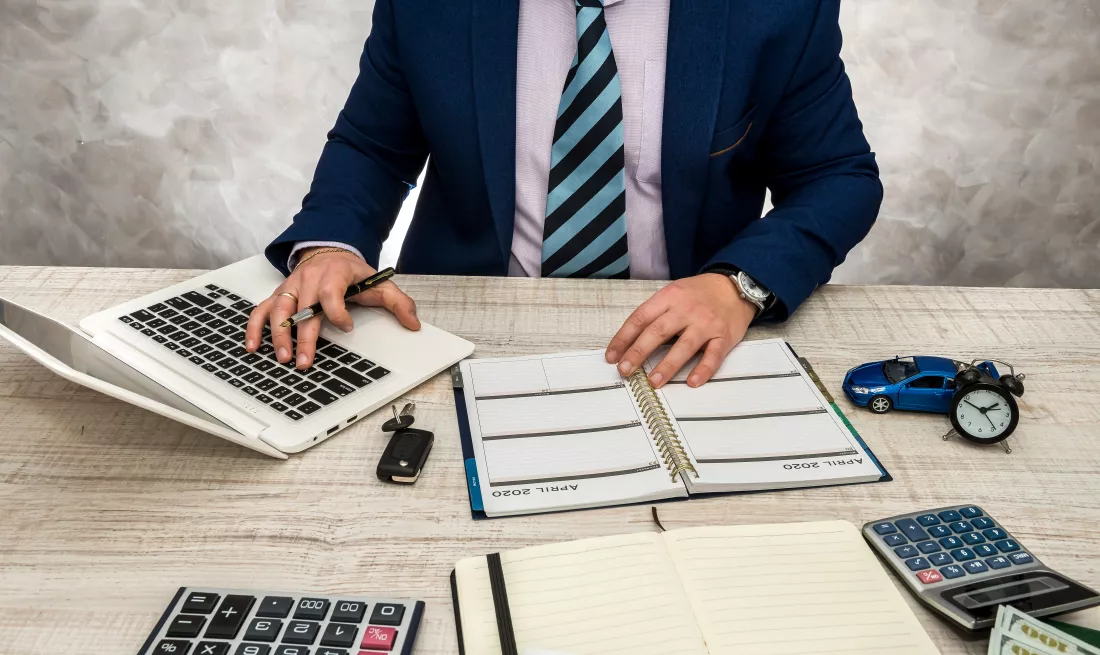 businessman-working-office-with-business-graphs-laptop-notepad